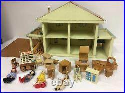 1960's Wooden Dolls House with furniture & dolls / by Gee Bee Toys