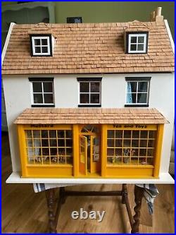 3 storey wooden dolls house and contents
