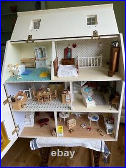 3 storey wooden dolls house and contents