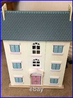 Beautiful Large Wooden Dolls House complete with miniature furniture and people