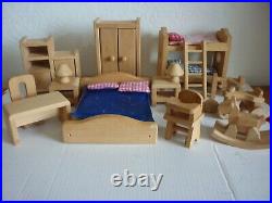 ELC Solid Wood dolls House with 13 Dolls and lots of furniture