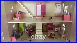 ELC wooden Rosebud Cottage dolls house with wooden accessories