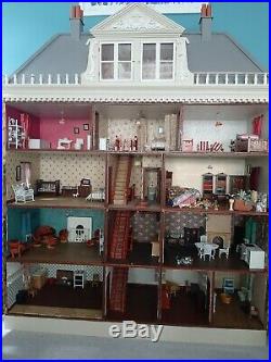 Georgian style Wooden dolls house with lights and furniture