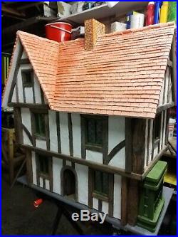 Handmade dolls house. Wooden structure. Height 27 depth 16 height 32