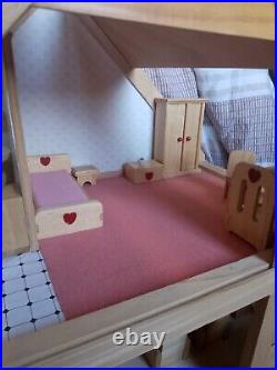 Joined Wooden Dolls House By Plan Toys. Lots Of Accessories
