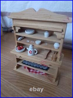 Joined Wooden Dolls House By Plan Toys. Lots Of Accessories