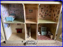 Large 1930's Wooden Vintage Doll House with a few furnishings