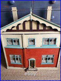 Large 1930's Wooden Vintage Doll House with a few furnishings