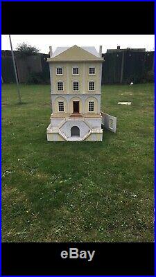 Large Wooden Dolls House With Dolls And Furniture