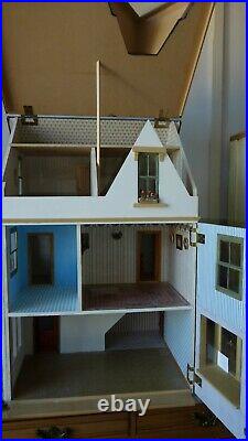 Large wooden dolls house Traditional. COLLECT ONLY