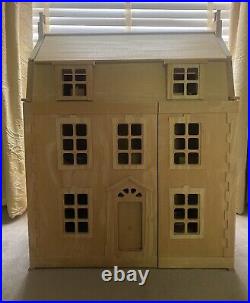 Plan Toys wooden dolls house