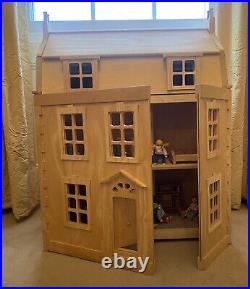 Plan Toys wooden dolls house