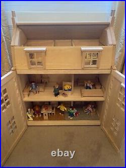 Plan Toys wooden dolls house