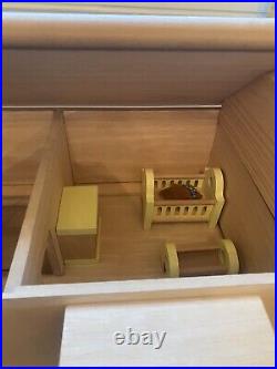 Plan Toys wooden dolls house