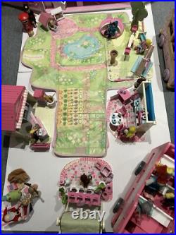 Rosebud Wooden dolls house And Village shops. Full furniture and figures inc Rosebud Wooden dolls house And Village shops. Full furniture and figures inc