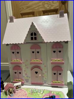 Rosebud Wooden dolls house And Village shops. Full furniture and figures inc Rosebud Wooden dolls house And Village shops. Full furniture and figures inc