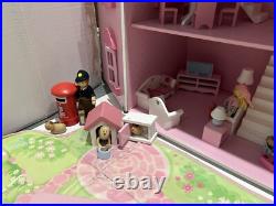 Rosebud Wooden dolls house And Village shops. Full furniture and figures inc Rosebud Wooden dolls house And Village shops. Full furniture and figures inc