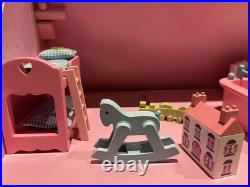 Rosebud Wooden dolls house And Village shops. Full furniture and figures inc Rosebud Wooden dolls house And Village shops. Full furniture and figures inc