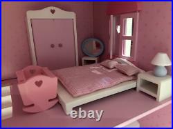Rosebud Wooden dolls house And Village shops. Full furniture and figures inc Rosebud Wooden dolls house And Village shops. Full furniture and figures inc
