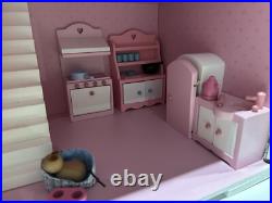 Rosebud Wooden dolls house And Village shops. Full furniture and figures inc Rosebud Wooden dolls house And Village shops. Full furniture and figures inc