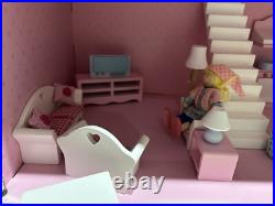 Rosebud Wooden dolls house And Village shops. Full furniture and figures inc Rosebud Wooden dolls house And Village shops. Full furniture and figures inc