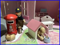 Rosebud Wooden dolls house And Village shops. Full furniture and figures inc Rosebud Wooden dolls house And Village shops. Full furniture and figures inc