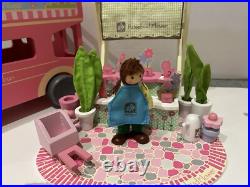 Rosebud Wooden dolls house And Village shops. Full furniture and figures inc Rosebud Wooden dolls house And Village shops. Full furniture and figures inc