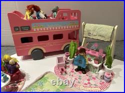 Rosebud Wooden dolls house And Village shops. Full furniture and figures inc Rosebud Wooden dolls house And Village shops. Full furniture and figures inc