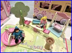 Rosebud Wooden dolls house And Village shops. Full furniture and figures inc Rosebud Wooden dolls house And Village shops. Full furniture and figures inc