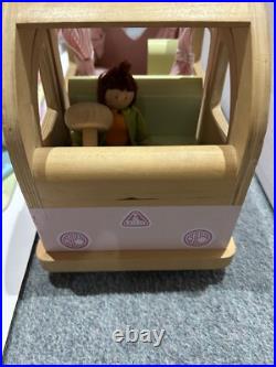 Rosebud Wooden dolls house And Village shops. Full furniture and figures inc Rosebud Wooden dolls house And Village shops. Full furniture and figures inc
