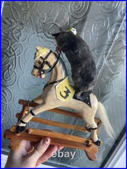Taxidermy mole displayed on rare antique wooden dolls house horse