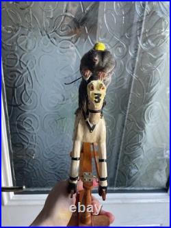 Taxidermy mole displayed on rare antique wooden dolls house horse