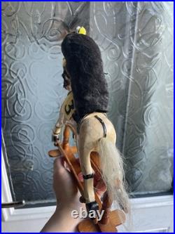 Taxidermy mole displayed on rare antique wooden dolls house horse