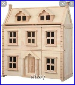 Victorian three storey wooden dolls house with all furniture plus figures