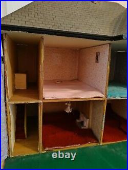 Vintage Tudor style Dolls House with a host of accessories furnished wooden