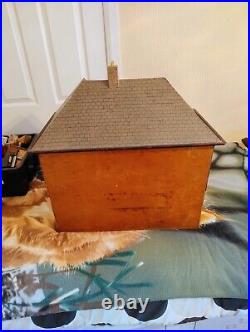 Vintage Tudor style Dolls House with a host of accessories furnished wooden