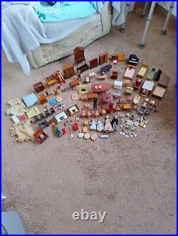 Vintage Tudor style Dolls House with a host of accessories furnished wooden