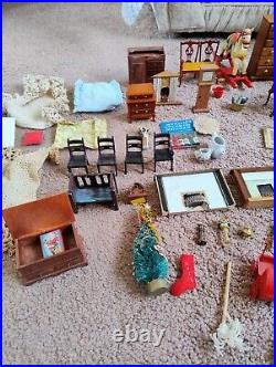 Vintage Tudor style Dolls House with a host of accessories furnished wooden