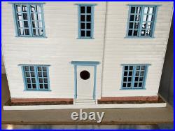 Vintage Wooden Dolls House with wooden cladding Vintage Wooden Dolls House with wooden cladding