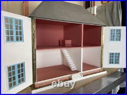 Vintage Wooden Dolls House with wooden cladding Vintage Wooden Dolls House with wooden cladding