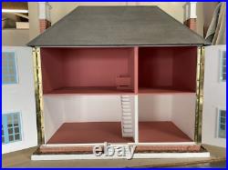 Vintage Wooden Dolls House with wooden cladding Vintage Wooden Dolls House with wooden cladding