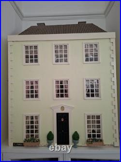 Vintage Wooden Dolls Mansion House and including furniture/dolls