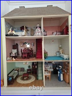 Vintage Wooden Dolls Mansion House and including furniture/dolls