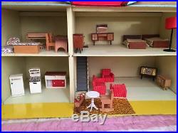 Vintage solid Wooden Dolls House with vintage furniture Made By Gee Bee