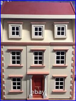 Wooden Doll House with furniture and figures Pre-Owned