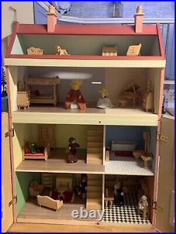 Wooden Doll House with furniture and figures Pre-Owned