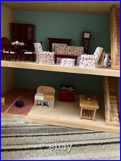 Wooden Doll House with variety of furniture