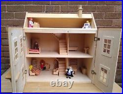 Wooden Dolls House Complete With Dolls And Furniture