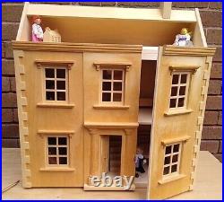 Wooden Dolls House Complete With Dolls And Furniture