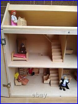 Wooden Dolls House Complete With Dolls And Furniture